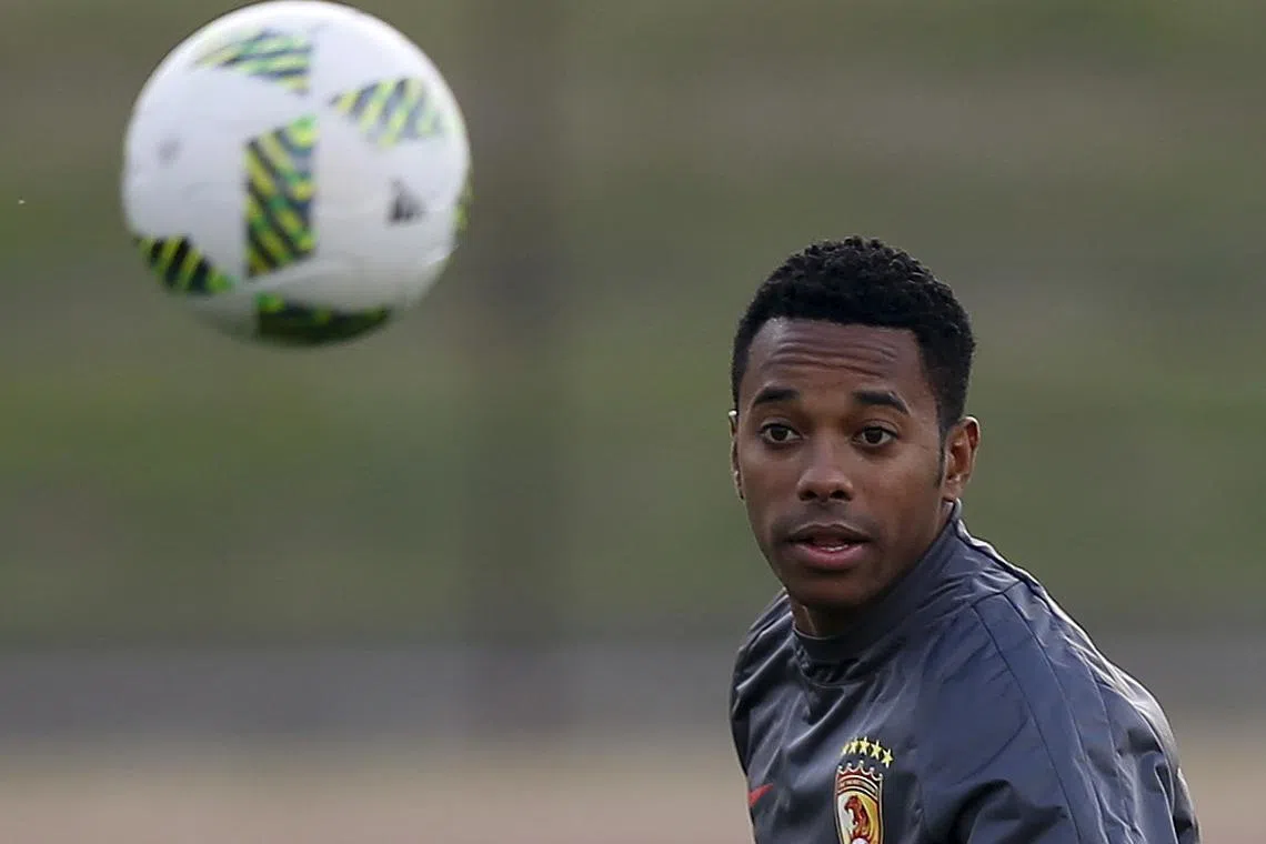 Guangzhou Evergrande's Robinho eyes the ball during a training session ahead of their Club World Cup semi-final soccer match against Barcelona in Yokohama, south of Tokyo, Japan, December 15, 2015.    REUTERS/Toru Hanai/FILE PHOTO