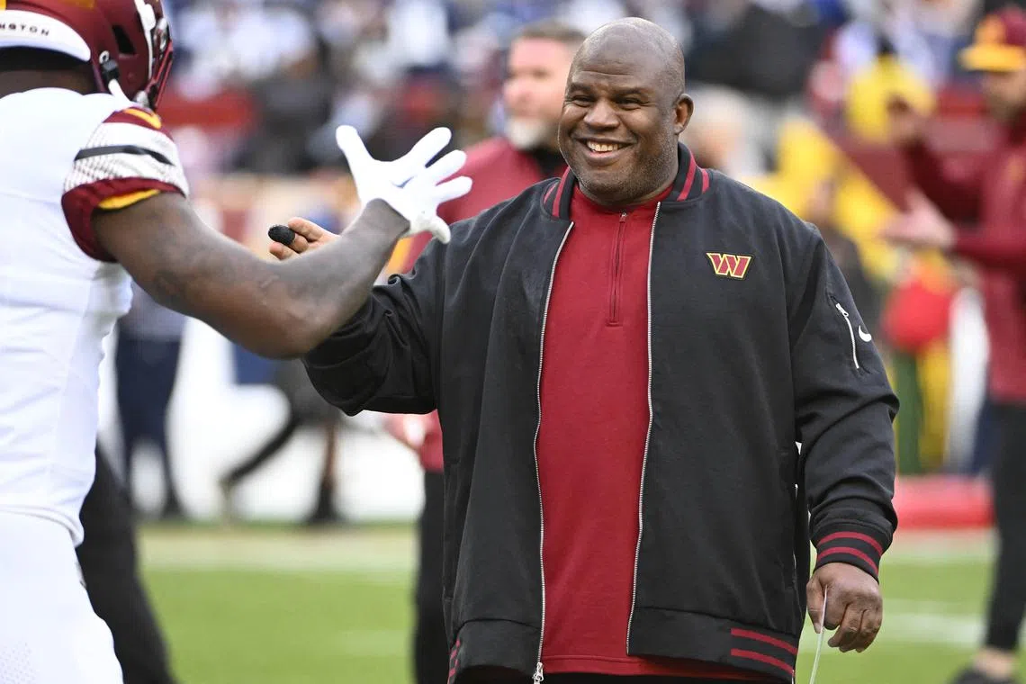 FILE PHOTO: Jan 7, 2024; Landover, Maryland, USA; Washington Commanders offensive coordinator Eric Bieniemy on the field before the game against the Dallas Cowboys at FedExField. Brad Mills-USA TODAY Sports/File Photo