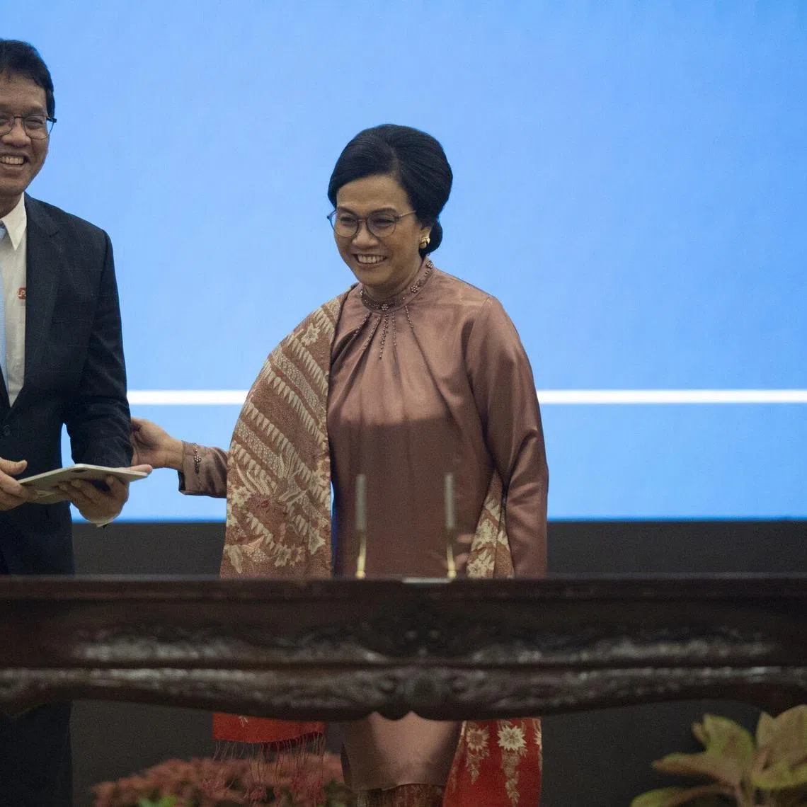 Outgoing finance minister Sri Mulyani Indrawati and her successor Purbaya Yudhi Sadewa at a handover ceremony in Jakarta on Sept 9. 