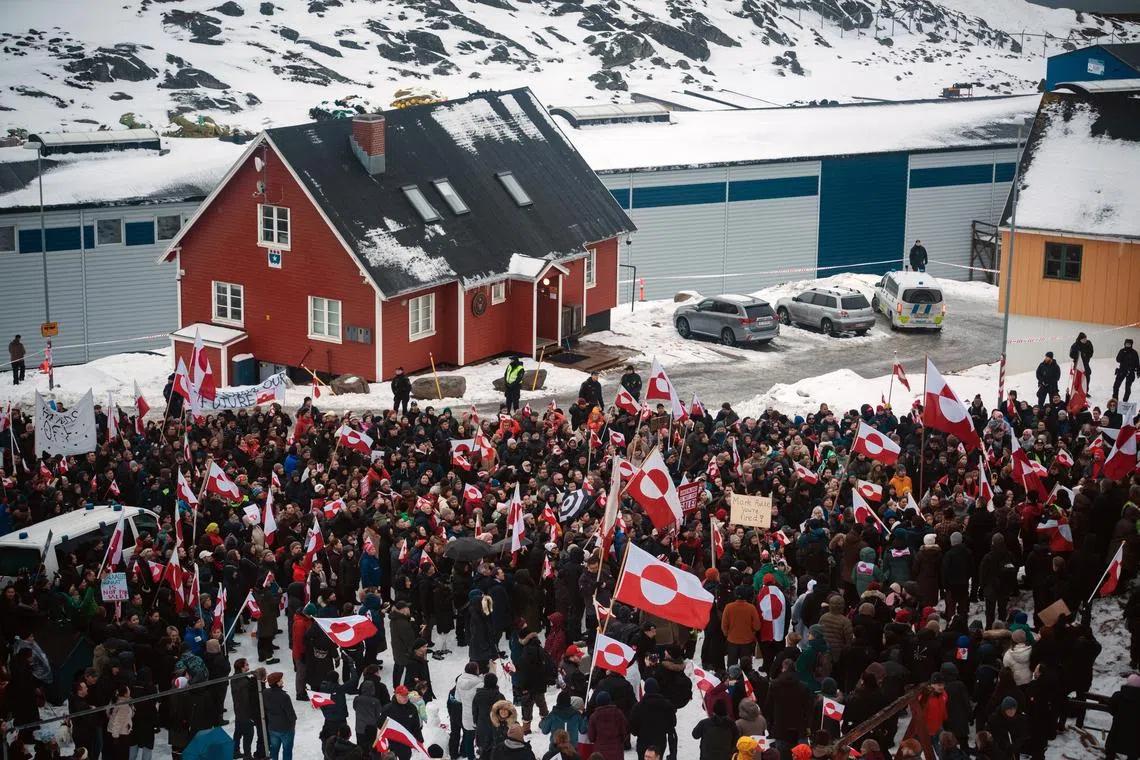 A protest to denounce President Donald Trump's threat to take over Greenland on Jan 17, in Nuuk, the capital of the Danish territory. 