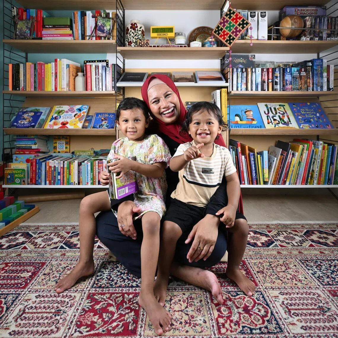 The Mum Collective SG founder Nurulhuda Mohamd Rasid with her daughter Naeema Taufiq, (left) four, and son Kareem Taufiq, 22 months, at home.