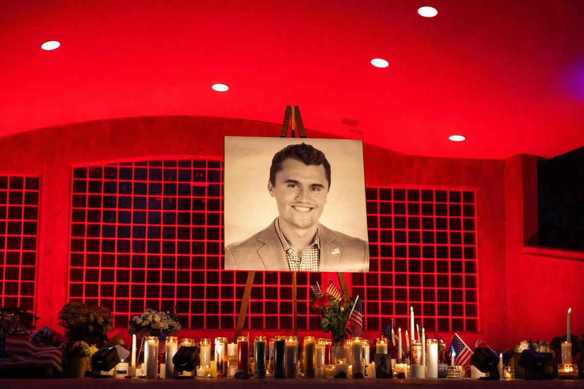 A photo of youth activist and influencer Charlie Kirk is seen at his makeshift memorial at Orem City Center Park in Orem, Utah, on Sept 11.