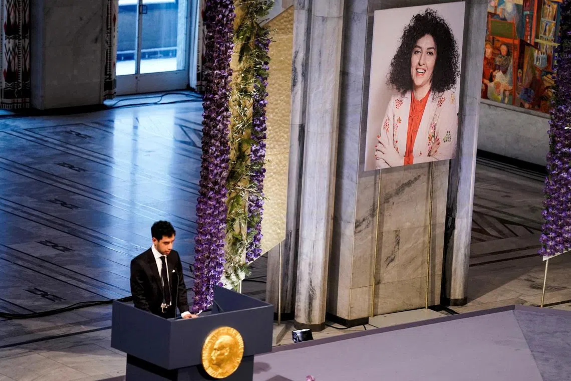 FILE PHOTO: Ali Rahmani, son of Narges Mohammadi, an imprisoned Iranian human rights activist, who was awarded the Nobel Peace Prize 2023, speaks after receiving the award on behalf of his mother at Oslo City Hall, Norway December 10, 2023. NTB/Fredrik Varfjell via REUTERS /File Photo