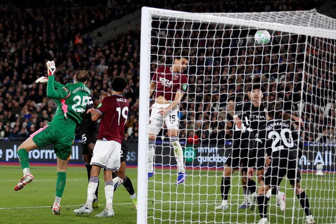West Ham United's Konstantinos Mavropanos (centre) heading home the equaliser against Manchester City on March 14.