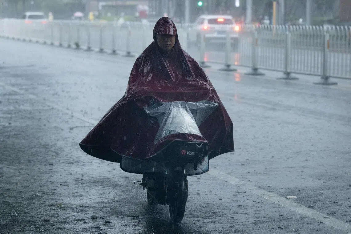 Typhoon Dolphin’s remnants brings torrential rain to Beijing