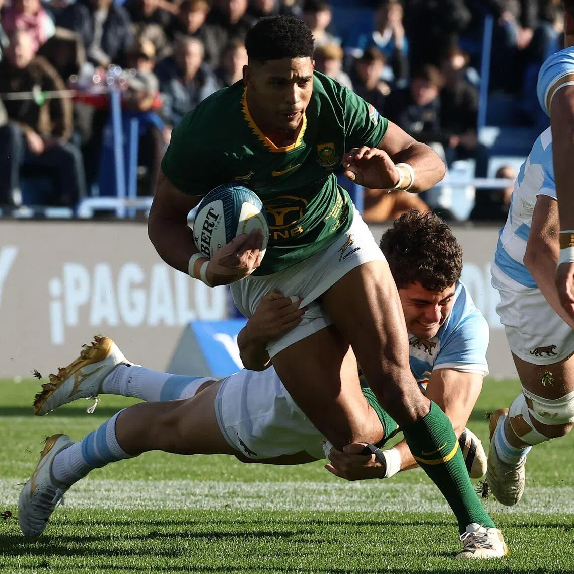 South Africa’s fly-half Sacha Feinberg-Mngomezulu is tackled by Argentina’s centre Faustino Sanchez Valarolo during a test match in Buenos Aires on Aug 8.