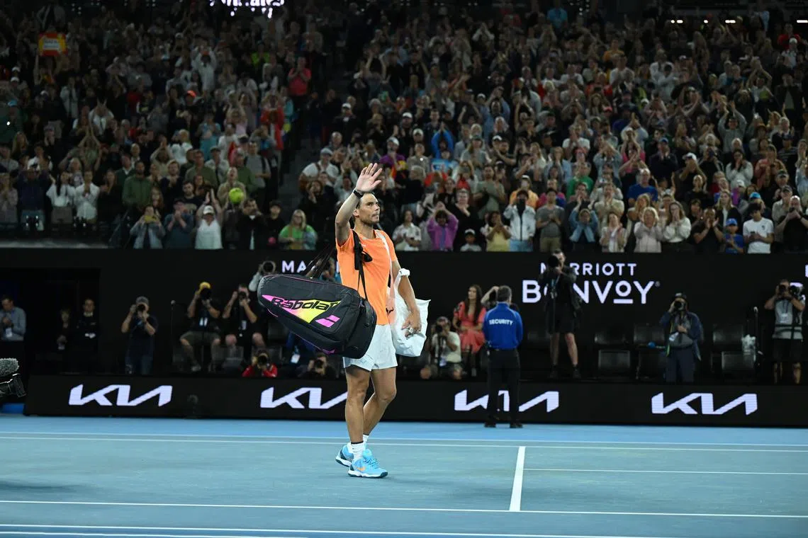 Rafael Nadal walks off after losing his match against Mackenzie McDonald at the Australian Open.