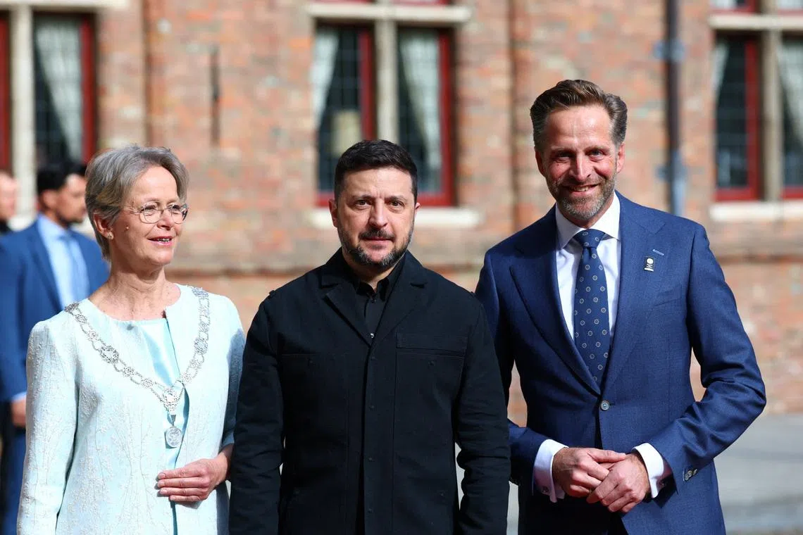 Middelburg mayor Yvonne van Mastrigt, Ukrainian President Volodymyr Zelensky, and Chairman of the Board of the Roosevelt Foundation H.M. de Jonge at the Four Freedoms Awards ceremony in Middelburg, Netherlands, on April 16, 2026.
