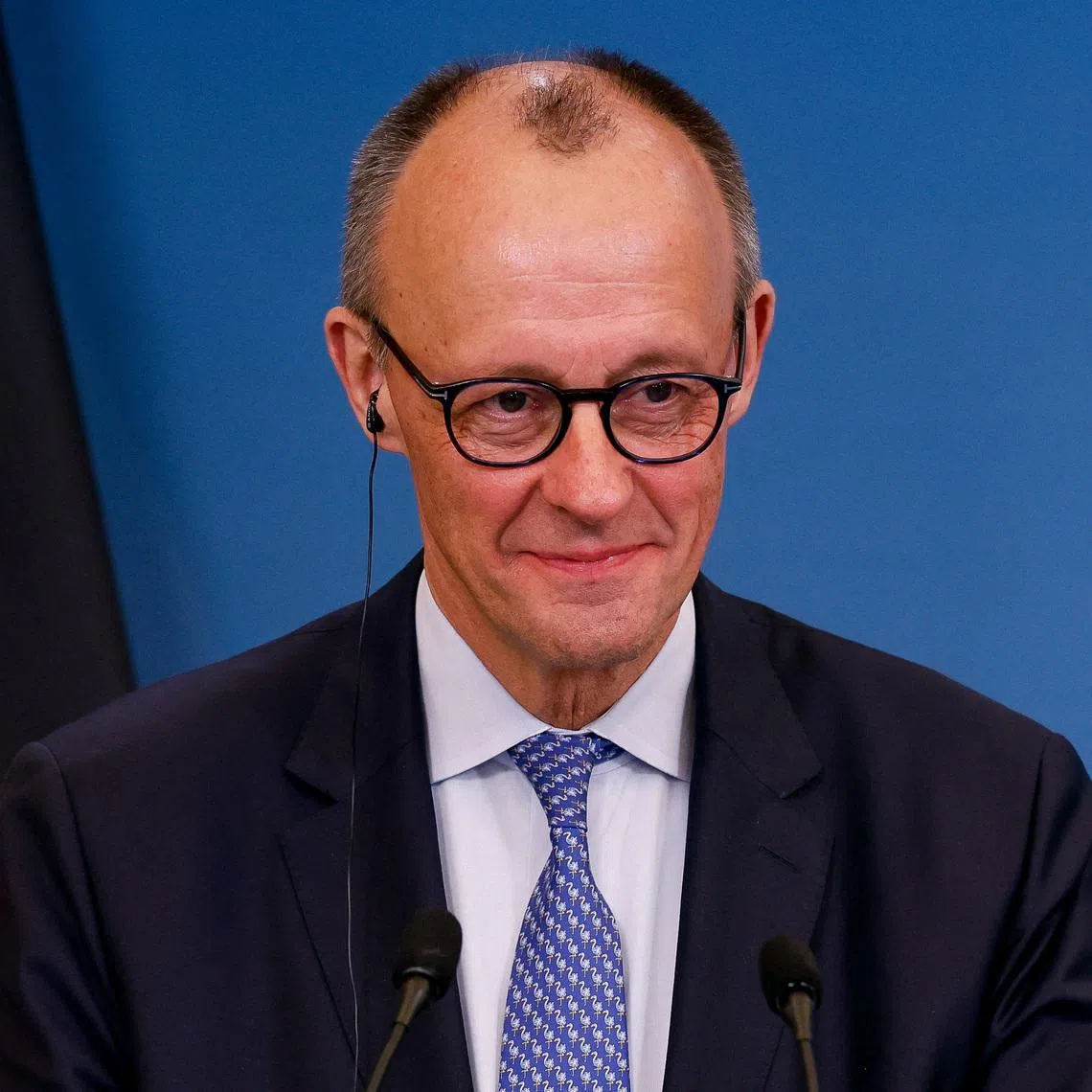 German Chancellor Friedrich Merz attends a  joint statement with Italian Prime Minister Giorgia Meloni (not pictured) at the end of Italian-German government consultations at Villa Doria Pamphili in Rome, Italy, January 23, 2026. REUTERS/Remo Casilli