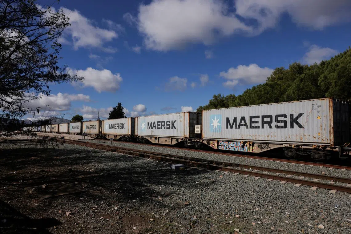 FILE PHOTO: Maersk containers are transported by train in Ronda, Spain October 27, 2024. REUTERS/Jon Nazca/File Photo