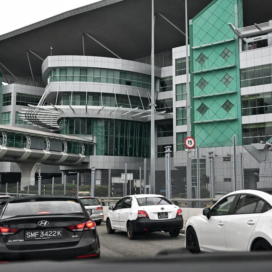 Cars entering Johor from Singapore at the Bangunan Sultan Iskandar (BSI) Customs Immigration and Quarantine (CIQ) complex.
