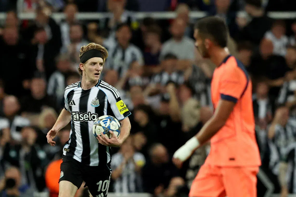 FILE PHOTO: Soccer Football - UEFA Champions League - Newcastle United v FC Barcelona - St James' Park, Newcastle, Britain - September 18, 2025 Newcastle United's Anthony Gordon celebrates scoring their first goal REUTERS/Scott Heppell/File Photo