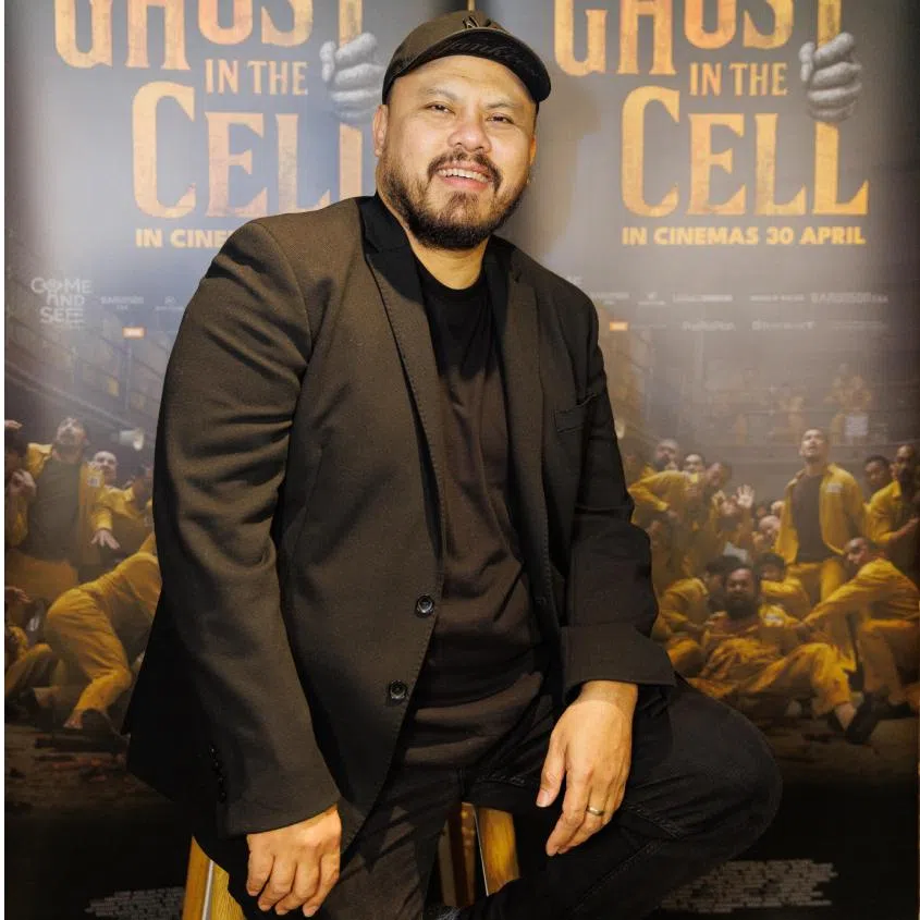 (From left) Indonesia film-maker Joko Anwar, during a Ghost In The Cell press stop at GV Suntec on April 23, lead actor Abimana Aryasatya (facing camera) in a movie still.
