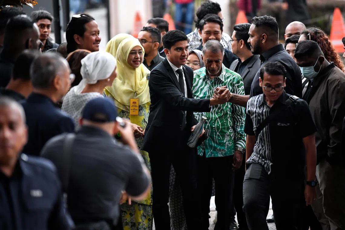 Muar MP Syed Saddiq Abdul Rahman was accompanied by his mother Shariffah Mahani Syed Abdul Aziz and his father Syed Abdul Rahman Abdullah Asagoff when present at the Kuala Lumpur Court Complex today.