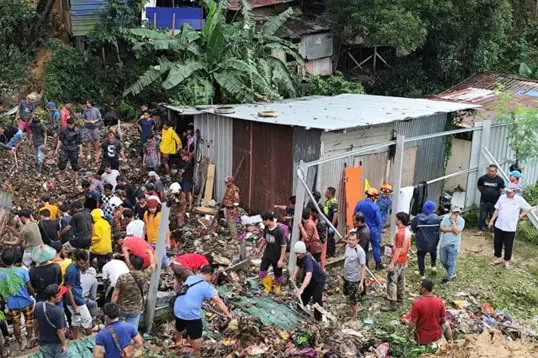 The victims, comprising 11 people, three adults and eight children, were all in a makeshift wooden house when the landslide struck on Sept 15.