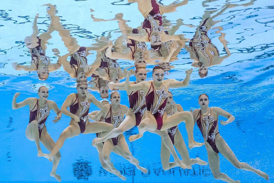 Neutral Athlete B Team competing in the final of the team technical artistic swimming event during the World Aquatics Championships in Singapore on July 22, 2025. 