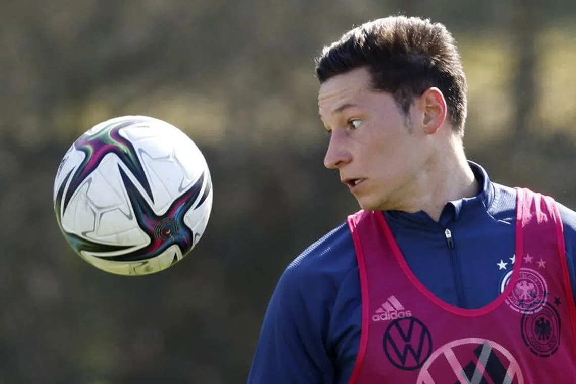 Soccer Football - Germany Training - Eintracht Frankfurt Training Ground, Frankfurt, Germany - March 22, 2022 Germany's Julian Draxler during training REUTERS/Heiko Becker/File photo