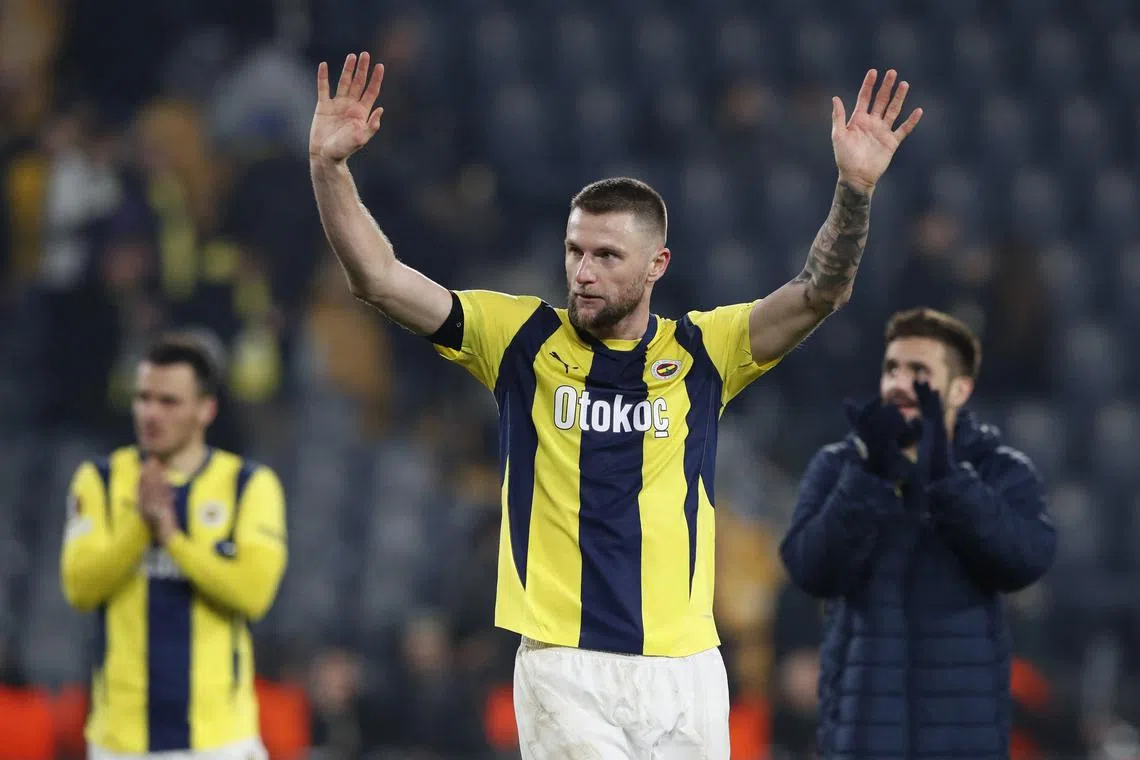 FILE PHOTO: Soccer Football - Europa League - Knockout Phase Playoff - First Leg - Fenerbahce v Anderlecht - Sukru Saracoglu Stadium, Istanbul, Turkey - February 13, 2025 Fenerbahce's Milan Skriniar celebrates after the match REUTERS/Dilara Senkaya/File Photo
