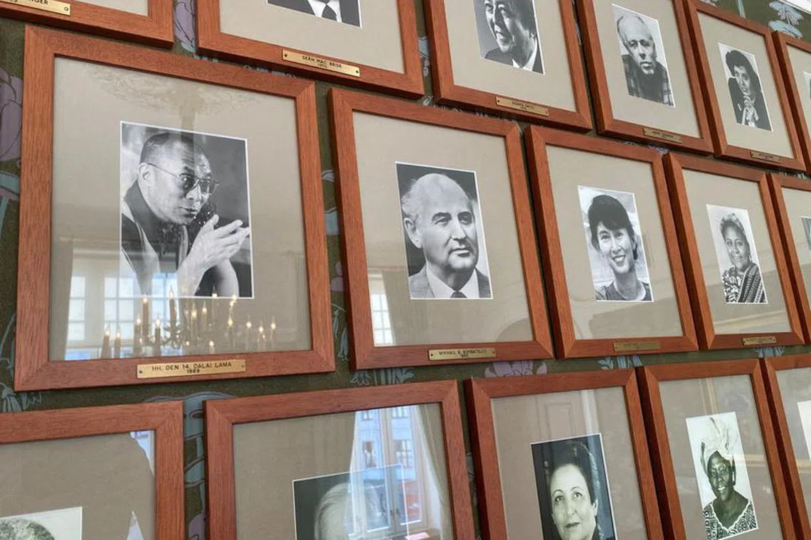 FILE PHOTO: Pictures of Nobel Prize laureates are displayed inside the Norwegian Nobel Institute in Oslo, Norway September 19, 2022. REUTERS/Victoria Klesty/File Photo