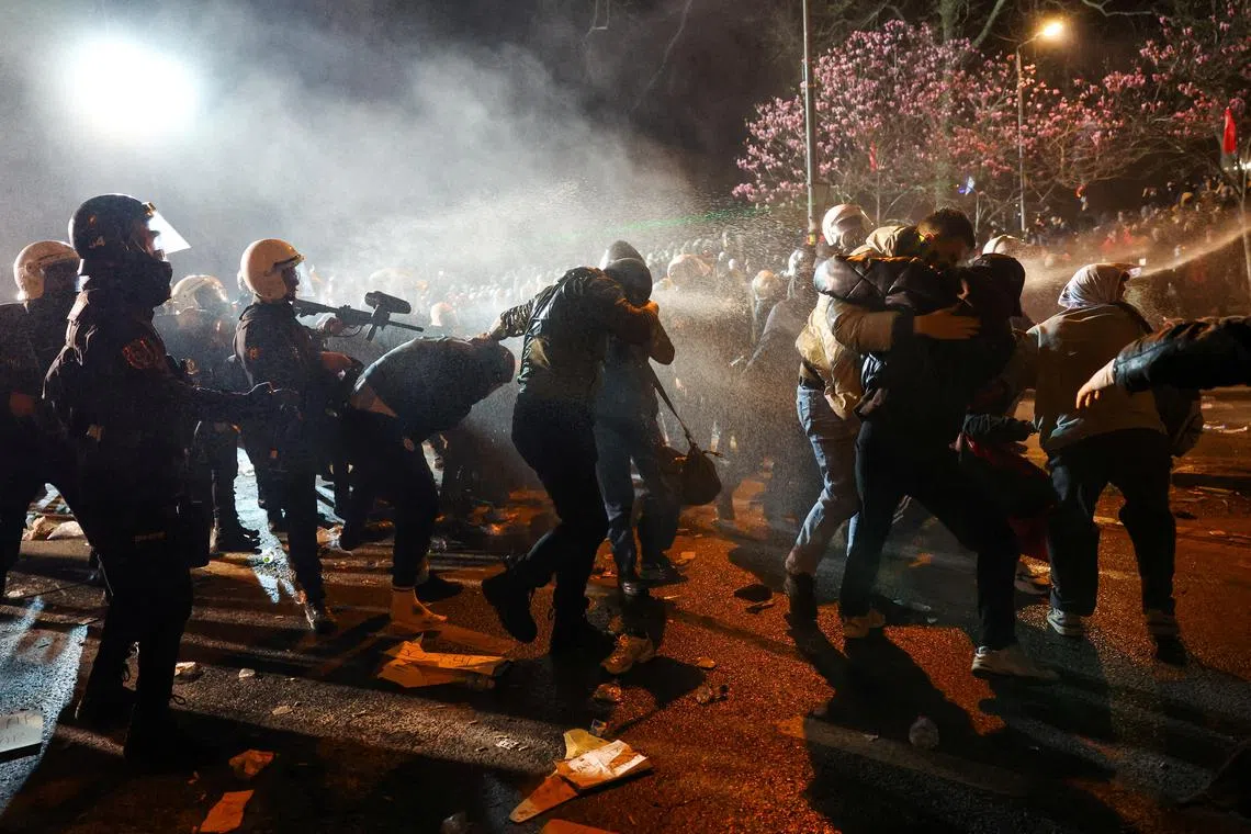 Police officers use pepper spray on demonstrators as people take part in a protest against the arrest of Istanbul Mayor Ekrem Imamoglu as part of a corruption investigation, in Istanbul, Turkey, March 24, 2025. REUTERS/Murad Sezer