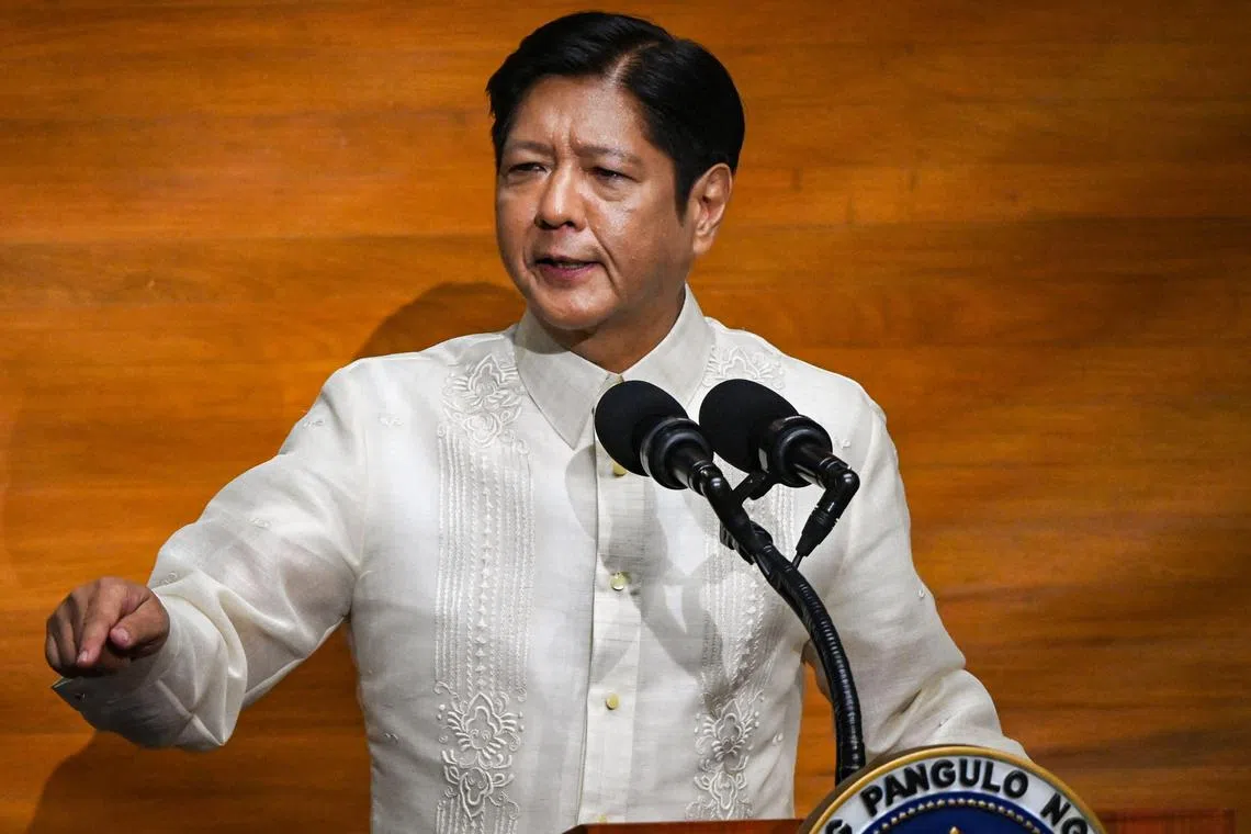 TOPSHOT - Philippine President Ferdinand Marcos delivers the annual State of the Nation Address at the House of Representatives in Manila on July 22, 2024. (Photo by Jam Sta Rosa / AFP)