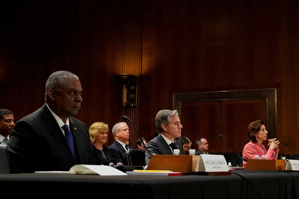 (From left) US Defense Secretary Lloyd Austin, Secretary of State Antony Blinken and Commerce Secretary Gina Raimondo at the Senate Appropriations Committee hearing.