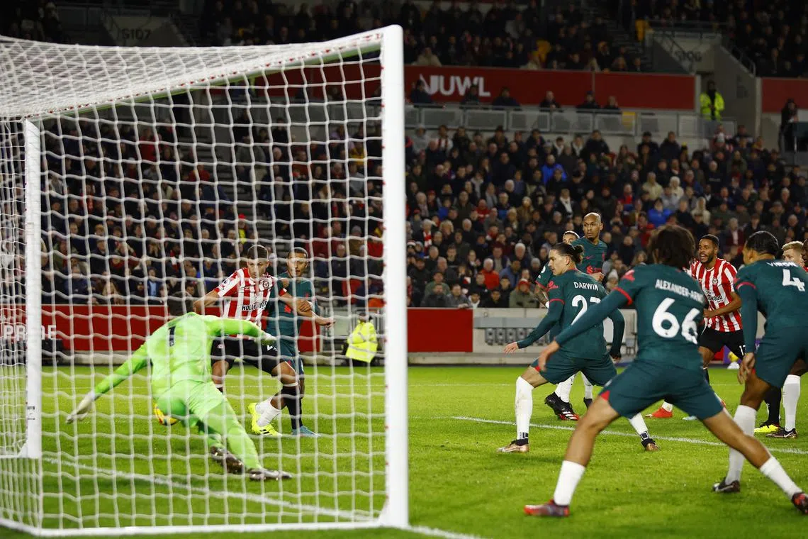 Liverpool's Ibrahima Konate scores an own goal.