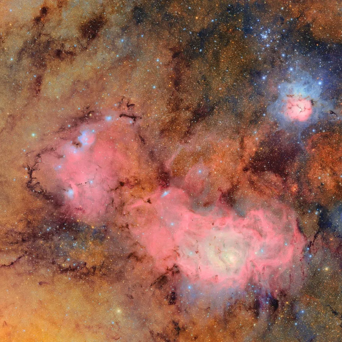 The Trifid and Lagoon Nebulae are seen in an image produced by the Vera C. Rubin Observatory, on Pachon Hill, Coquimbo Region, Chile June 12, 2025. RubinObs/NOIRLab/SLAC/NSF/DOE/AURA/Handout via REUTERS