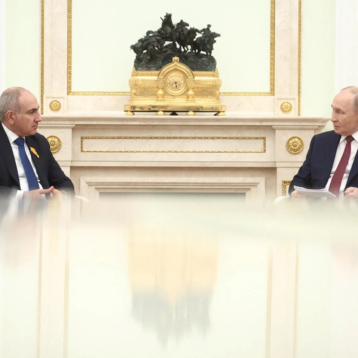 Russian President Vladimir Putin and Armenian Prime Minister Nikol Pashinyan attend a meeting at the Kremlin in Moscow, Russia, April 1, 2026. Sputnik/Sofya Sandurskaya/Pool via REUTERS