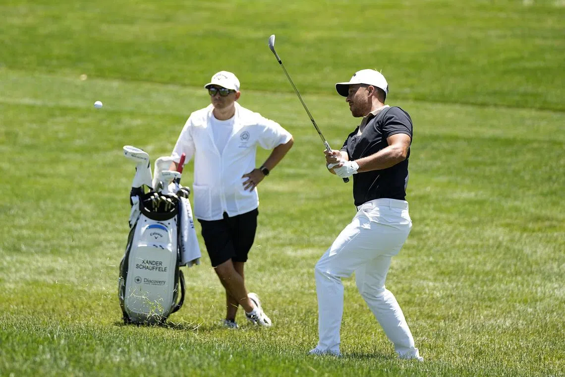 Jun 9, 2024; Dublin, Ohio, USA; Xander Schauffele hits on the fourth hole during the final round of the Memorial Tournament at Muirfield Village Golf Club. Mandatory Credit: Adam Cairns-USA TODAY Sports