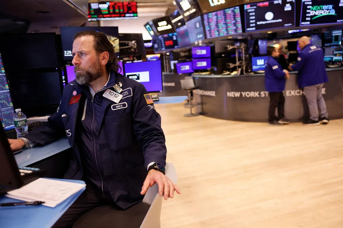 Traders work on the floor of the New York Stock Exchange, during afternoon trading on Jan 17, 2024 in New York City.