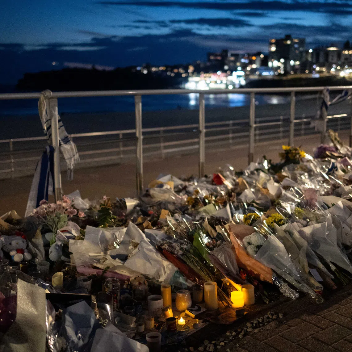 Flameless candles are lit for the victims of a mass shooting during a Jewish Hanukkah celebration at Bondi Beach in Sydney on December 14, in Sydney, Australia, December 20, 2025. REUTERS/Eloisa Lopez/File Photo