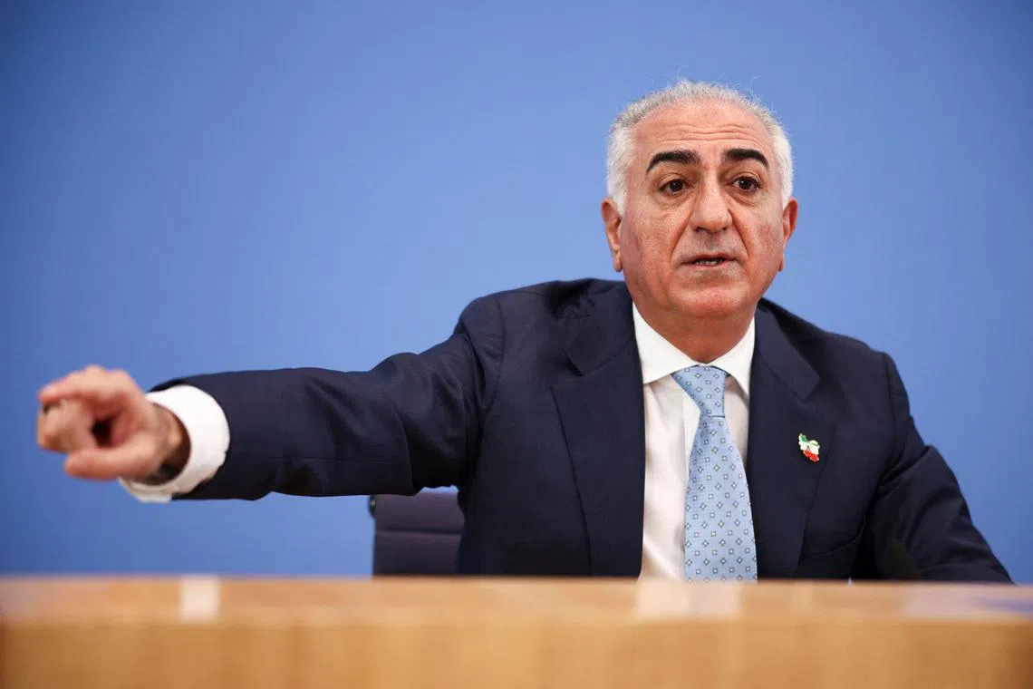 Reza Pahlavi, the exiled son of Iran's last shah and an Iranian opposition figure, gestures as he speaks during a press conference at the House of the Bundespressekonferenz in Berlin, Germany, April 23, 2026. REUTERS/Liesa Johannssen