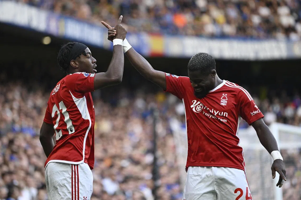 Nottingham Forest's Anthony Elanga (left) celebrates with Serge Aurier after scoring against Chelsea.