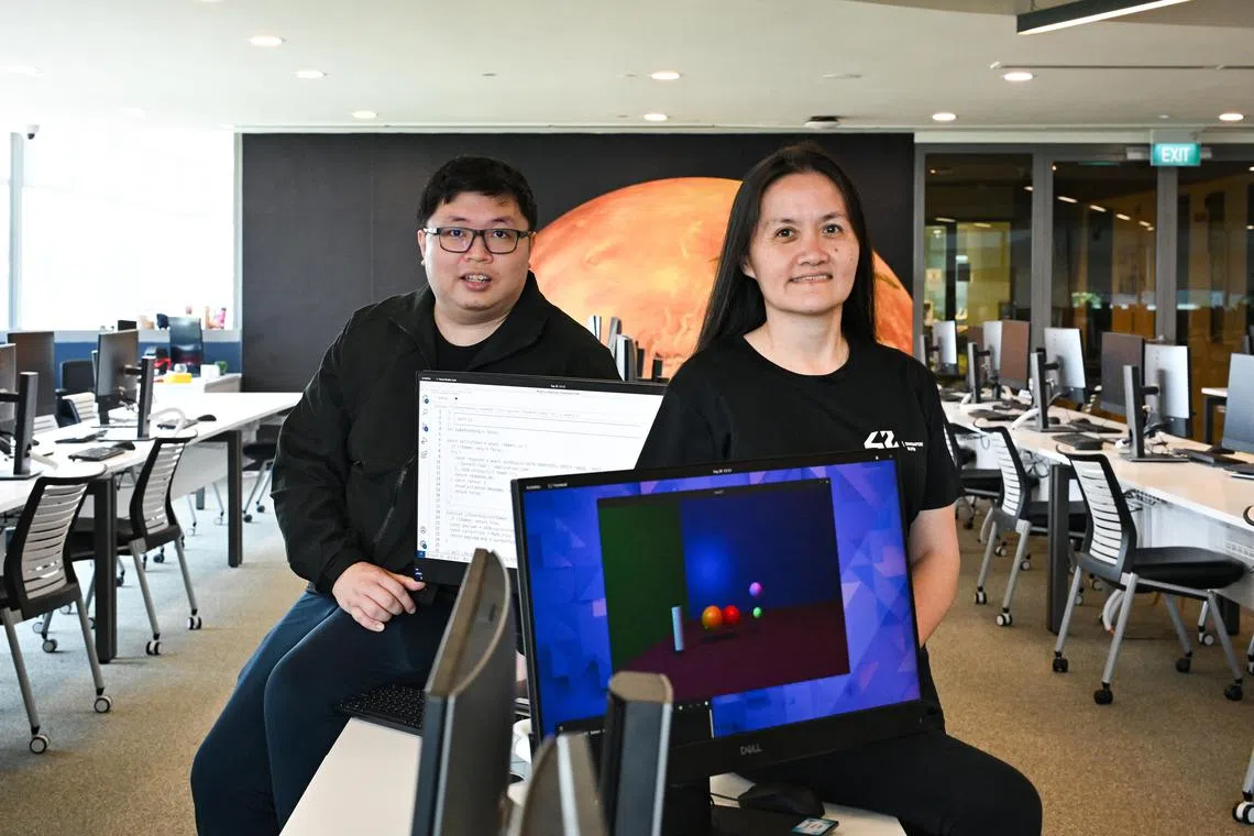 ST20240928-202488800725-Lim Yaohui-Elisha Tushara-etsutd/
Mr Jeffrey Goh, 34, Intern at GovTech, and Ms Wendy Huang, 49, Senior Principal Engineer at HTX, at the 42 Singapore lab in SUTD on Sept 28, 2024.
The story will feature 2 students from the first 42 SG intake (Wendy and Jeffrey), who are the fastest in their cohort to complete the first 9 modules in the core curriculum, making them one of the top 50 students to do so globally.
Following the same principles of École 42, in Sep 2023 SUTD offered the 42 SG programme, where there are no tuition fees, formal lessons, textbooks or teachers. Students learn at their own pace advancing stage-by-stage through project-based learning, peer-to-peer learning and gamification.
(ST PHOTO: LIM YAOHUI)