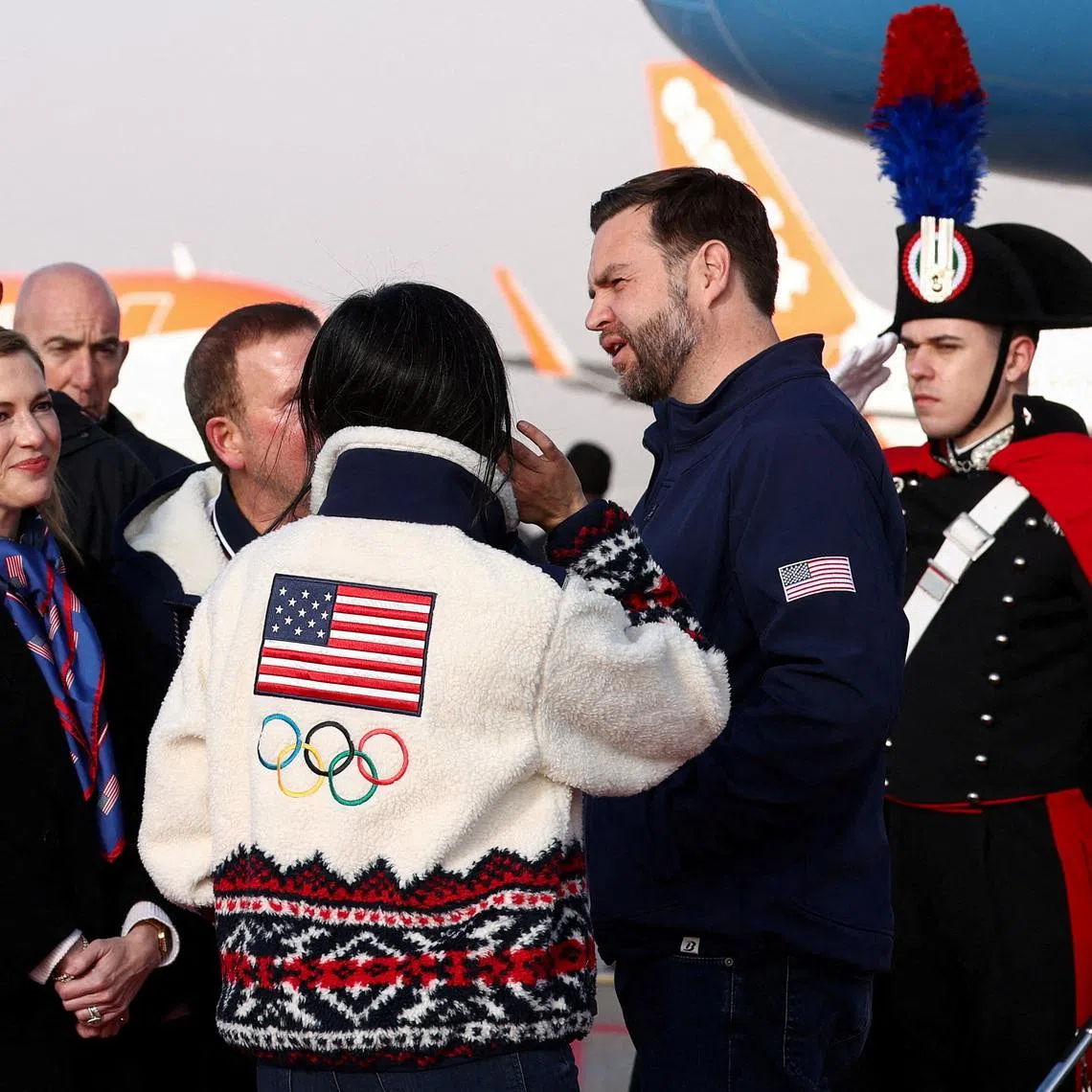 U.S. Ambassador to Italy and San Marino Tilman Fertitta and his wife Lauren Fertitta welcome U.S. Vice President JD Vance and second lady Usha Vance as they arrive, ahead of the Milano Cortina 2026 Winter Olympics in Milan, Italy, February 5, 2026. REUTERS/Kevin Lamarque/Pool