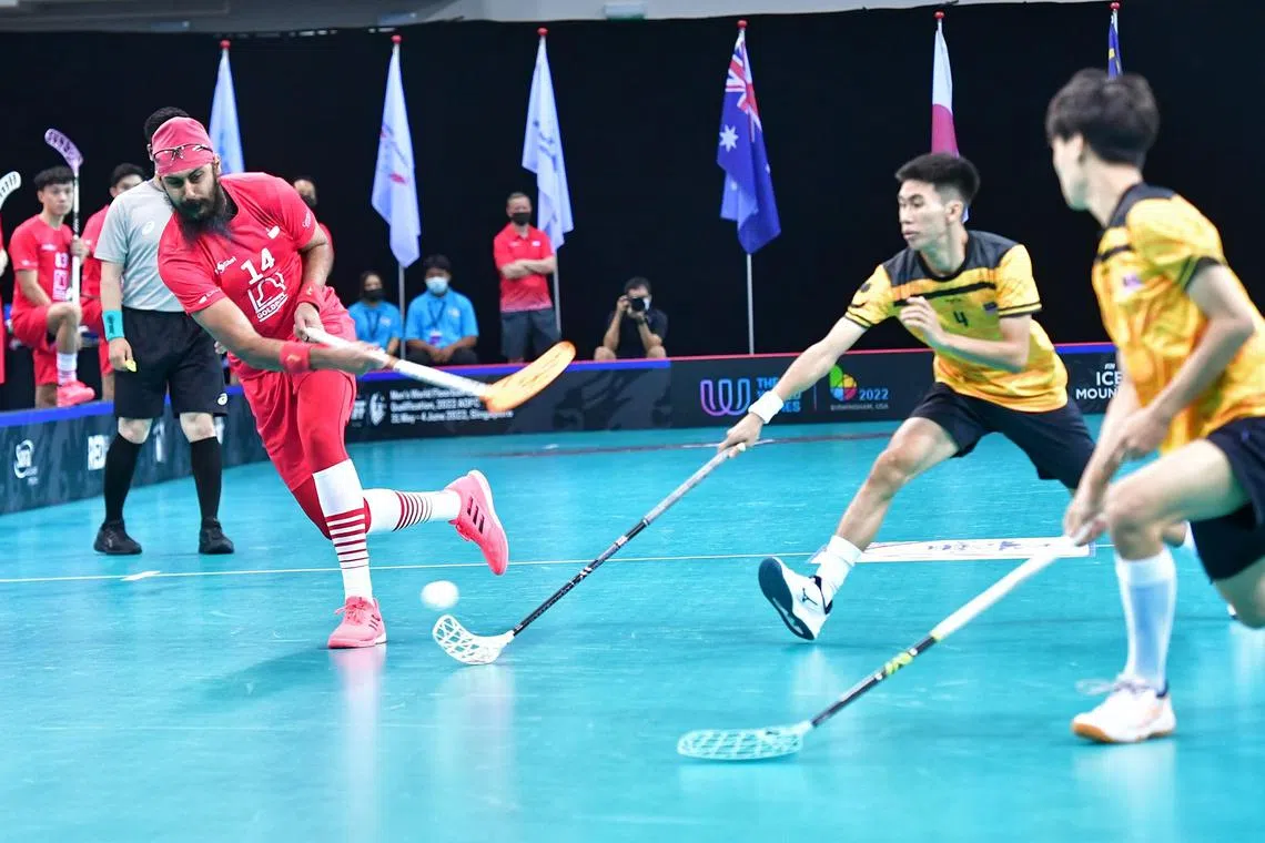 Singapore defender Ishwarpal Singh taking a shot during his debut against Malaysia at the Men's World Floorball Championship (WFC) Asia-Oceania qualifier held at the OCBC Arena on 31 May 2022. In May, Singh took to social media to hit out at the “disrespect and unprofessionalism” shown towards him by men’s floorball coach Sonia Chia