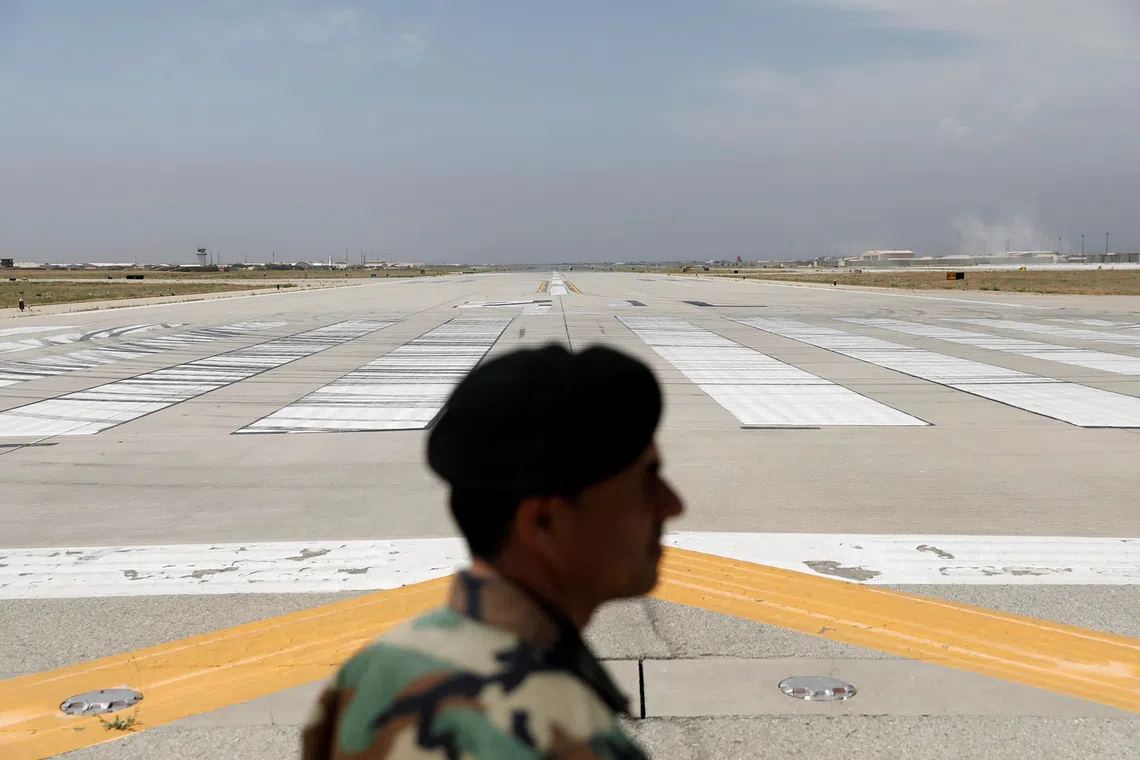 FILE PHOTO: Runway is seen at Bagram U.S. air base, after American troops vacated it, in Parwan province, Afghanistan July 5, 2021. REUTERS/Mohammad Ismail/ File Photo