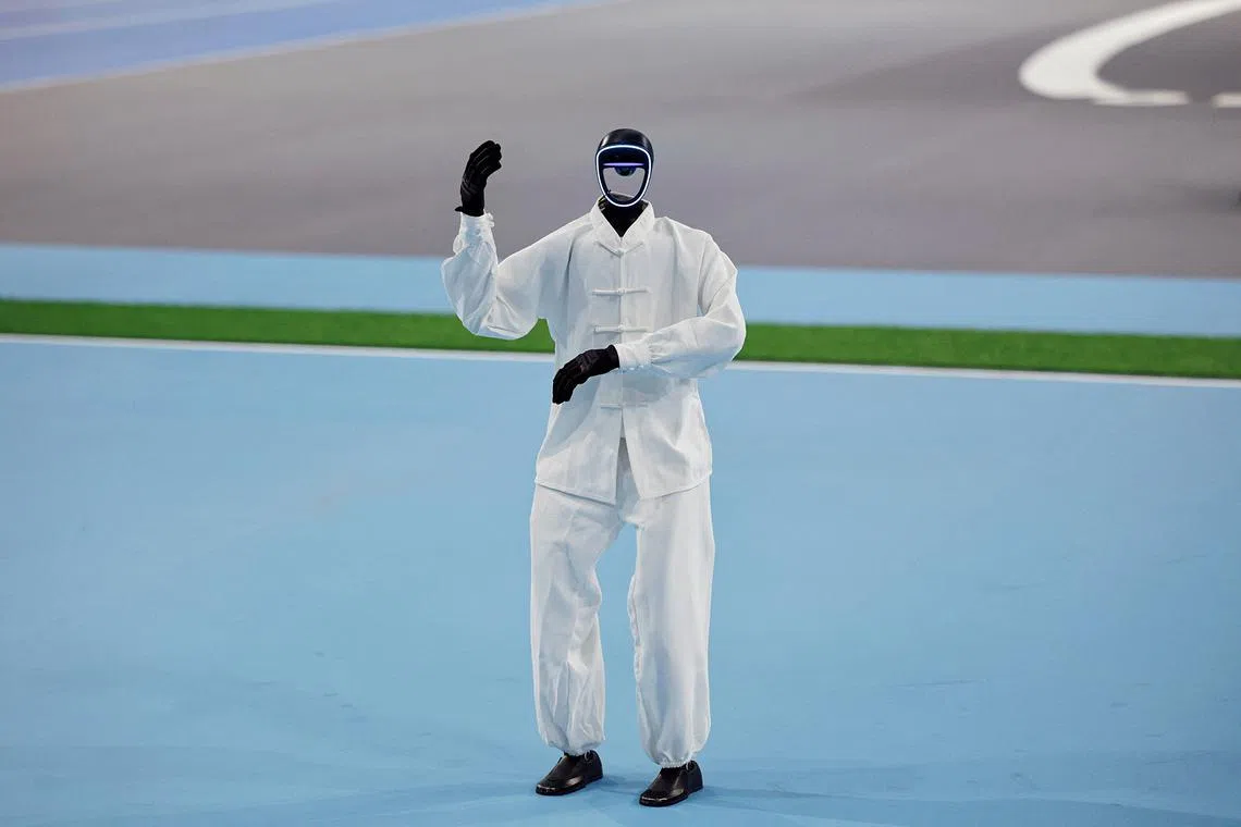A humanoid robot from the Deep Turing Apex team takes part in the martial arts competition at the inaugural World Humanoid Robot Games, at the National Speed Skating Oval in Beijing, China, on Aug 15, 2025. 