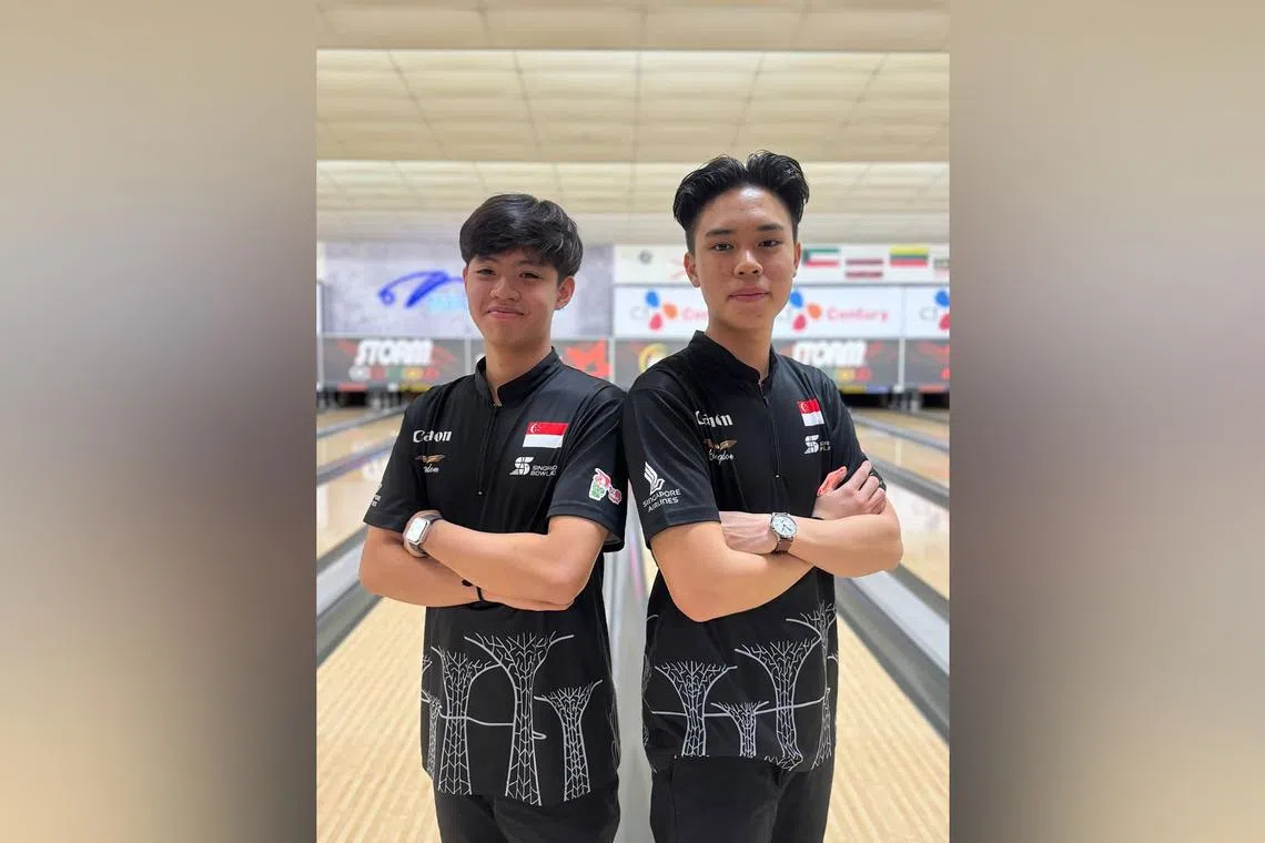 Singapore bowlers Joshua Soo (left) and Aviel Chua (right) clinched the boys' doubles title at the Asian Junior Tenpin Bowling Championships on June 19.