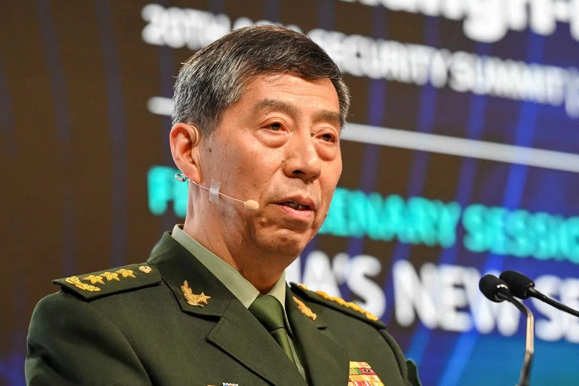 (FILES) China's Minister of National Defence Li Shangfu delivers a speech during the 20th Shangri-La Dialogue summit in Singapore on June 4, 2023. The US government believes China's Defense Minister Li Shangfu is the subject of an investigation by Beijing and has been relieved of his duties, the Financial Times reported, citing American officials. (Photo by ROSLAN RAHMAN / AFP)