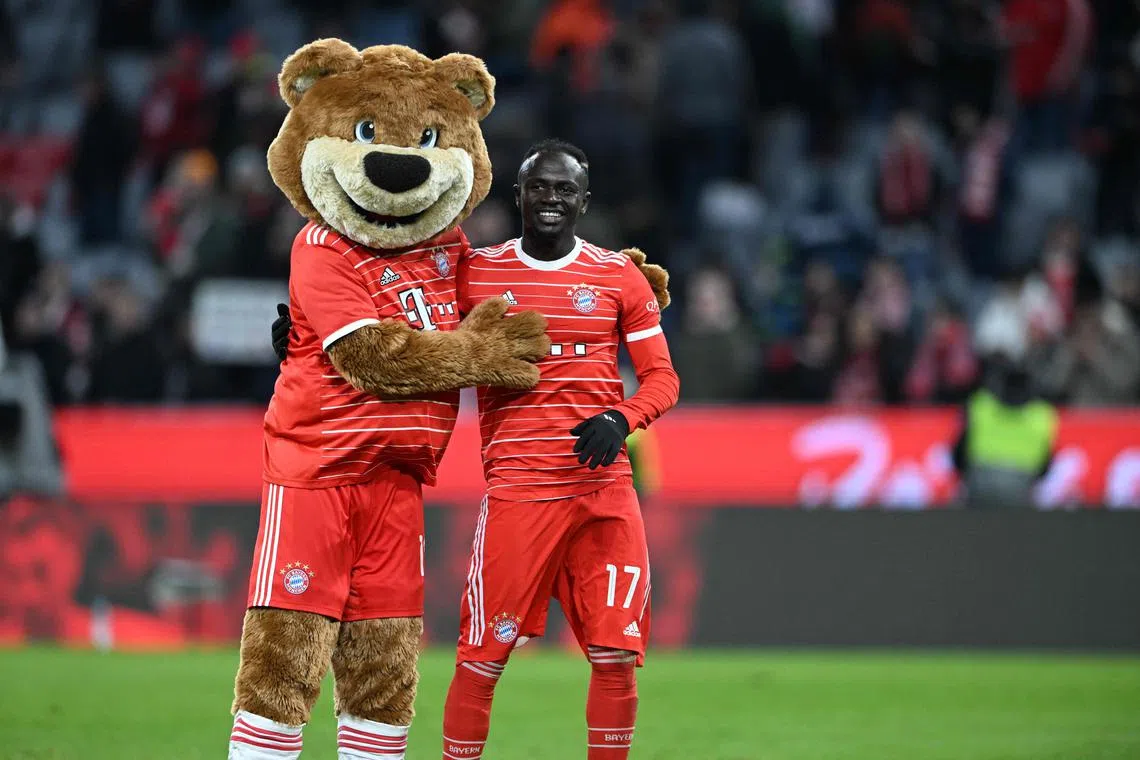 Bayern Munich forward Sadio Mane, pictured with Berni the team mascot, is in line for his first start in four months after a leg injury when they face PSG on Wednesday.