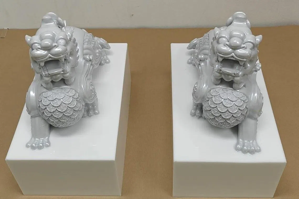 About 4.15kg of Ice was found hidden within the base structures of two ornamental lion figurines.