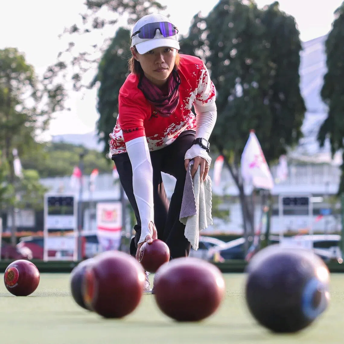 Singapore lawn bowler Serena Tiong, 38, training at Kallang Lawn Bowl on July 9, 2026. ST PHOTO: BRIAN TEO