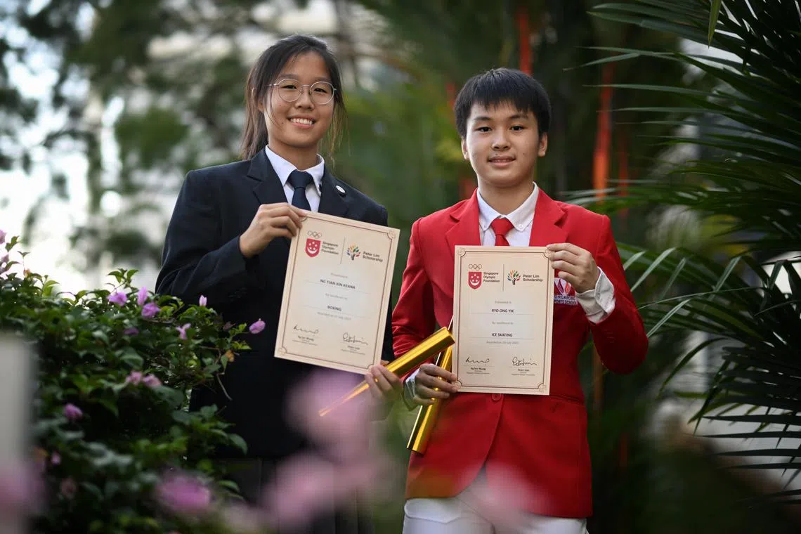 Boxer Keana Ng and Ice Skater Ryo Ong were recipients of the Singapore Olympic Foundation - Peter Lim Scholarship on Monday.

ST PHOTO: CHONG JUN LIANG