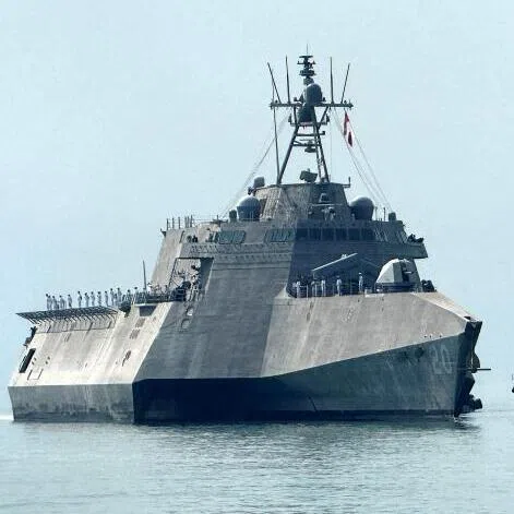 (Left) The US Navy's USS Cincinnati (LCS-20) littoral combat ship. President Donald Trump’s administration has touted its success at taking out suspected drug trafficking vessels in the area.