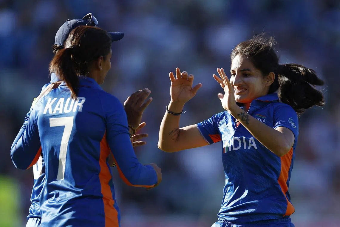 FILE PHOTO: Commonwealth Games - Women's Cricket T20 - Australia v India - Gold Medal - Edgbaston Stadium, Britain - August 7, 2022 India's Renuka Singh Thakur celebrates after taking the wicket of Australia's Grace Harris REUTERS/Jason Cairnduff/File Photo