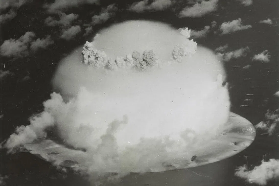 A mushroom cloud rises with ships below during Operation Crossroads nuclear weapons test on Bikini Atoll, Marshall Islands in this 1946 handout provided by the U.S. Library of Congress.  REUTERS/U.S. Library of Congress/Handout via Reuters