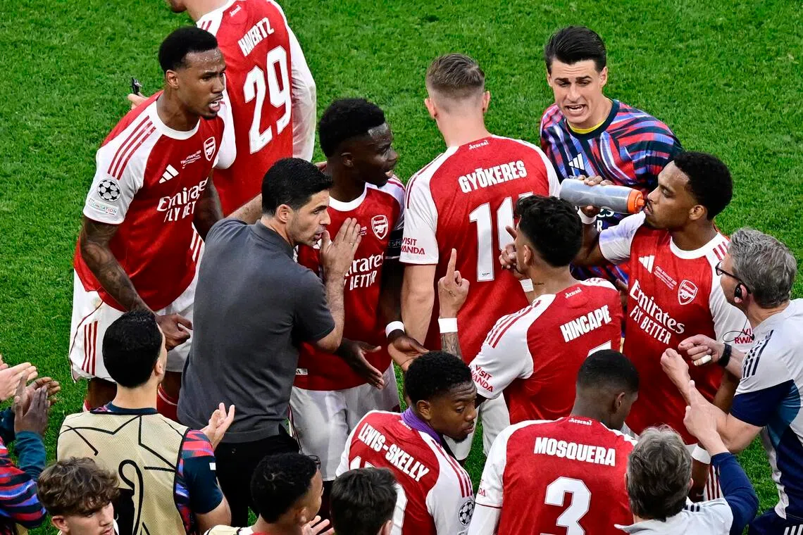 Arsenal manager Mikel Arteta speaking to players during the 2025-26 Champions League final which they lost to Paris Saint-Germain.