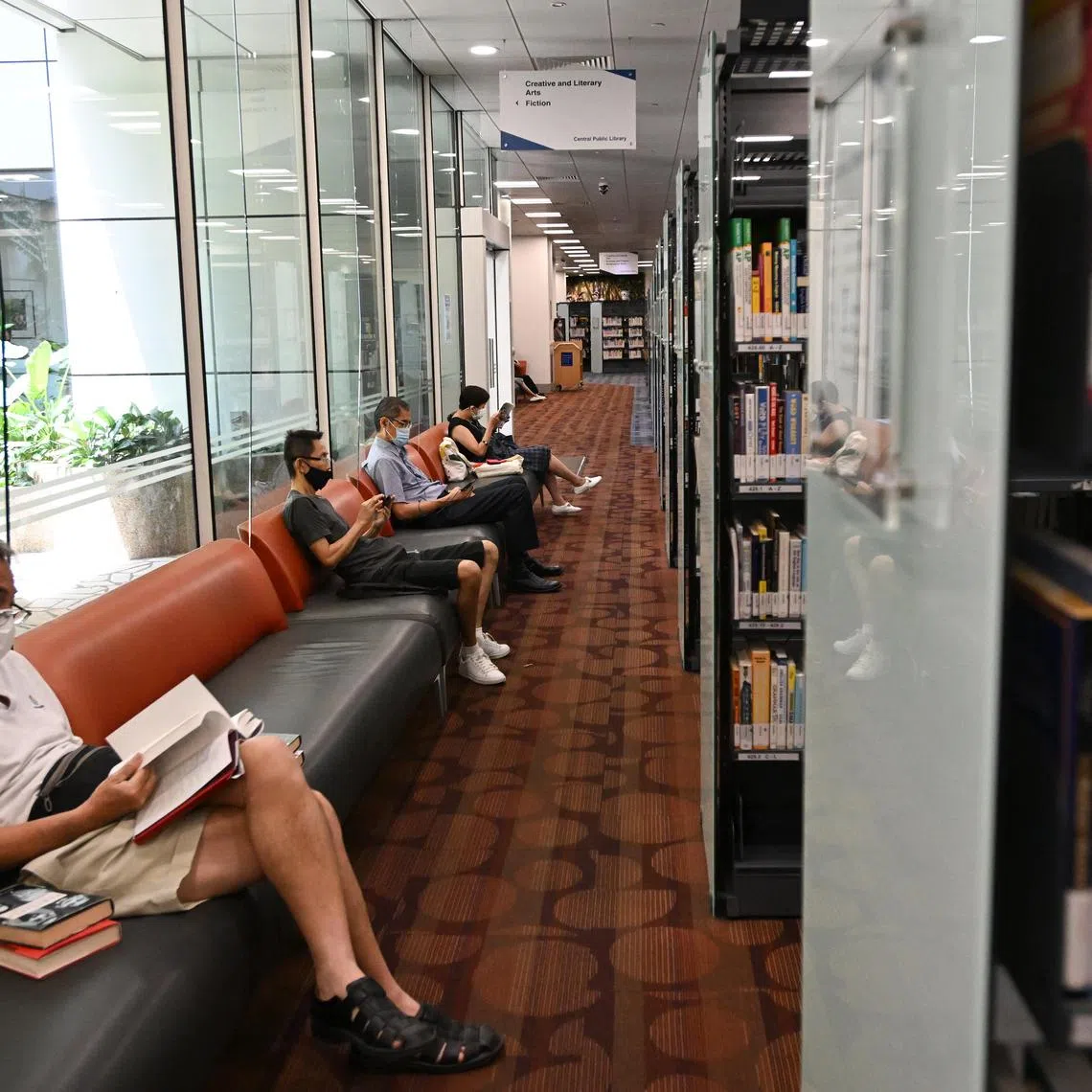 Visitors reading in Central Public Library.